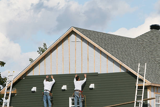 Professional Siding technician working in Union City, OH